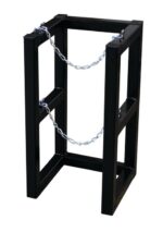 The Justrite Gcyl Barricade Rack, 1X1 is a black metal rectangular frame with an industrial and minimalist design, featuring chains connecting the sides for support. Ideal for securely holding various objects, its simple structure offers a practical solution reminiscent of modern utility racks.