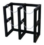 The Justrite Gcyl Barricade Rack,2X1, features a black metal frame that securely holds two cylinders. Equipped with safety chains and rectangular openings, it is designed to stand independently, combining functionality with a modern aesthetic.