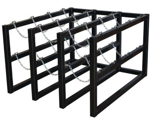 The Justrite Gcyl Barricade Rack,3X4 is a black metal structure with multiple chain-secured sections, ideal for holding cylinders like gas tanks. Its 3X4 rectangular frame is artistically captured from an angle, emphasizing its depth and dimension.