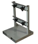 A gray metal frame stand, the Justrite Gcyl Fklft Pllt, 2Cyl model, features a flat base with two rectangular slots and two horizontal bars. Each bar includes two black clamps for securely holding objects.