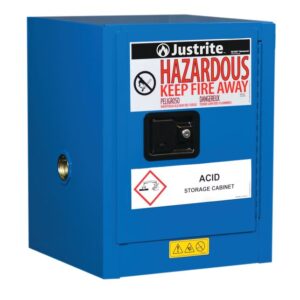 The blue Justrite Haz M Ctop Chmc 4G Sc Cabinet is designed for acid storage and features safety labels, including a multilingual hazardous warning sign on the door reading Hazardous, Keep Fire Away, to ensure proper storage of dangerous materials.