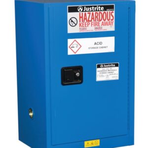 The blue Justrite Cabinet, labeled Hazardous Keep Fire Away and Acid Storage Cabinet, features a lockable handle and various hazard warning labels including corrosive material and fire risk symbols. Ideal for safely storing Haz M Cmp Chmc 12G Sc items.