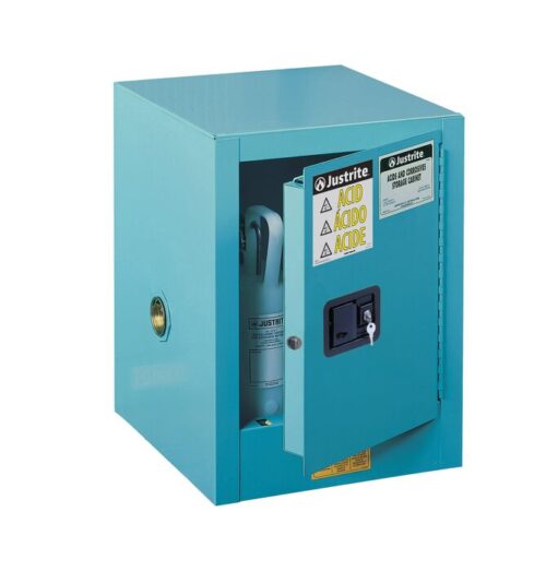 The Justrite Cabinet, Acid Ctop 4G, in Man Blu showcases a partially open door for hazardous material storage, marked with warning labels. A lock is on the handle, and a vent hole is visible on the side.