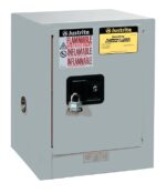 The Justrite Cabinet, Flam Ctop 4G in gray, includes multiple warning labels, a black handle, and a secure silver padlock to ensure safe storage of flammable liquids.