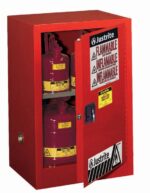 The Justrite Cabinet in Man Red opens to show three safety cans, clearly labeled Flammable and Inflammable, demonstrating the sturdy design for securely storing hazardous materials like Flam Cmp 12G.