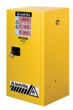The Justrite Cabinet, Flam Cmp 15G, Man Yel is a yellow rectangular storage for flammable materials. It features a black handle, padlock, and is labeled with KEEP FIRE AWAY and INFLAMMABLE, along with essential safety symbols.