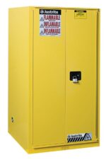 The Justrite Cabinet Cmbs P&I 96G Man Yel is a yellow, two-door flammable storage unit with English and Spanish warning signs and a secure handle for safety.
