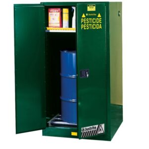The Justrite 55G Cab Mr Gr Pest Safe Ex features an open door displaying a blue barrel and assorted containers on the top shelf. Bright yellow hazard labels and Pesticide on the doors ensure secure, organized chemical storage.