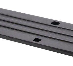 The Justrite Chock, Ac, Acc, 3518, Rpad is a black rectangular metal plate with parallel grooves and six evenly spaced holes for mounting. Its smooth industrial surface emphasizes functionality and precision.