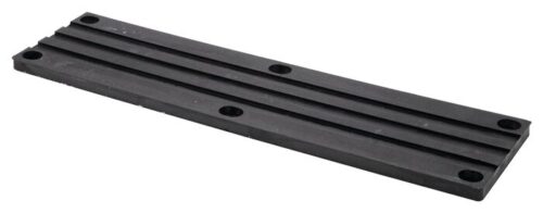 A Justrite Chock,Ac,Acc,3521,Rpad is shown as a black rectangular metal plate with grooves and six evenly spaced holes, featuring a smooth matte finish and resting at an angle on a white background.