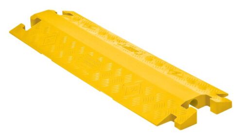 The Justrite Cp,Lb,1Ch,1.25,Gp,Do,Y is a yellow plastic ramp with a diamond-pattern texture and grooves to cover cables or hoses and prevent tripping hazards. It features interlocking ends for connecting multiple units, ideal for ensuring safety at events and perfect for 1Ch setups.