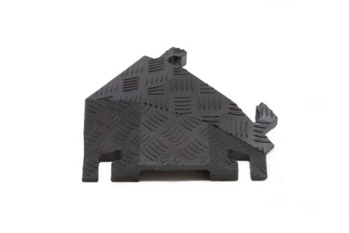 Introducing the Justrite Cp,Fl,1Ch,1,45Rt,B—a black rubber doorstop designed in a house shape with a textured checkered surface for enhanced grip and style.