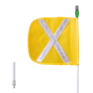 A yellow Justrite Whip,Gp,5,Lit,F12,Yf,Wx,Qd safety flag has a reflective silver X and a green light on top, mounted on a pole. Nearby is the F12 metal connector piece for secure attachment.