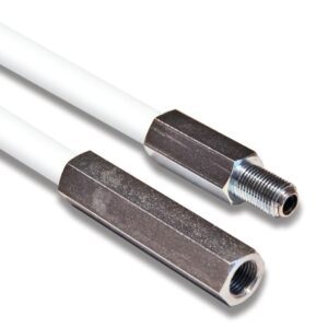 Two white coaxial cables with metallic connectors are displayed. One, resembling a Justrite Whip, Gp, 3, Ext, is threaded and points right; the other is open-ended and points to the bottom left. The background remains pristine white.