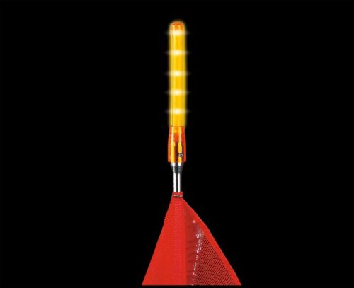 A vibrant orange LED safety wand with a textured handle and glowing tip, combined with a red mesh flag similar to the Justrite Whip model Acc,Lgt,Led,Glo,1156,A, stands out against a solid black backdrop.