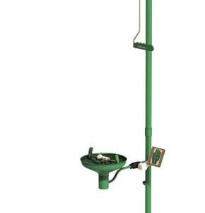 The Justrite H Combshwr in green is essential for labs, featuring an Opn Ss Bowl on a vertical pole with a showerhead and an eyewash basin labeled for eye and body safety.
