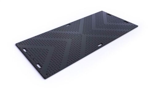 The Justrite Mats Libmat 4X8 black mat features a textured chevron pattern with raised dots for grip and has rectangular edge cutouts for carrying or securing. Set against a plain white background, the design is noticeably sleek.