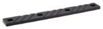 The Justrite Chock,Mc,Acc,3011,Rpad is a flat rectangular black metal strip with four evenly spaced holes and diagonal grooves.