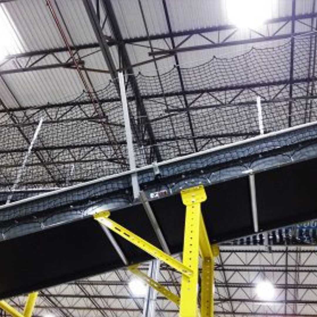 InCord Conveyor Guard netting suspended beneath an overhead conveyor run