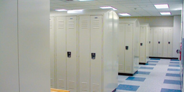 Rows of light gray Penco Vanguard steel lockers in a locker room
