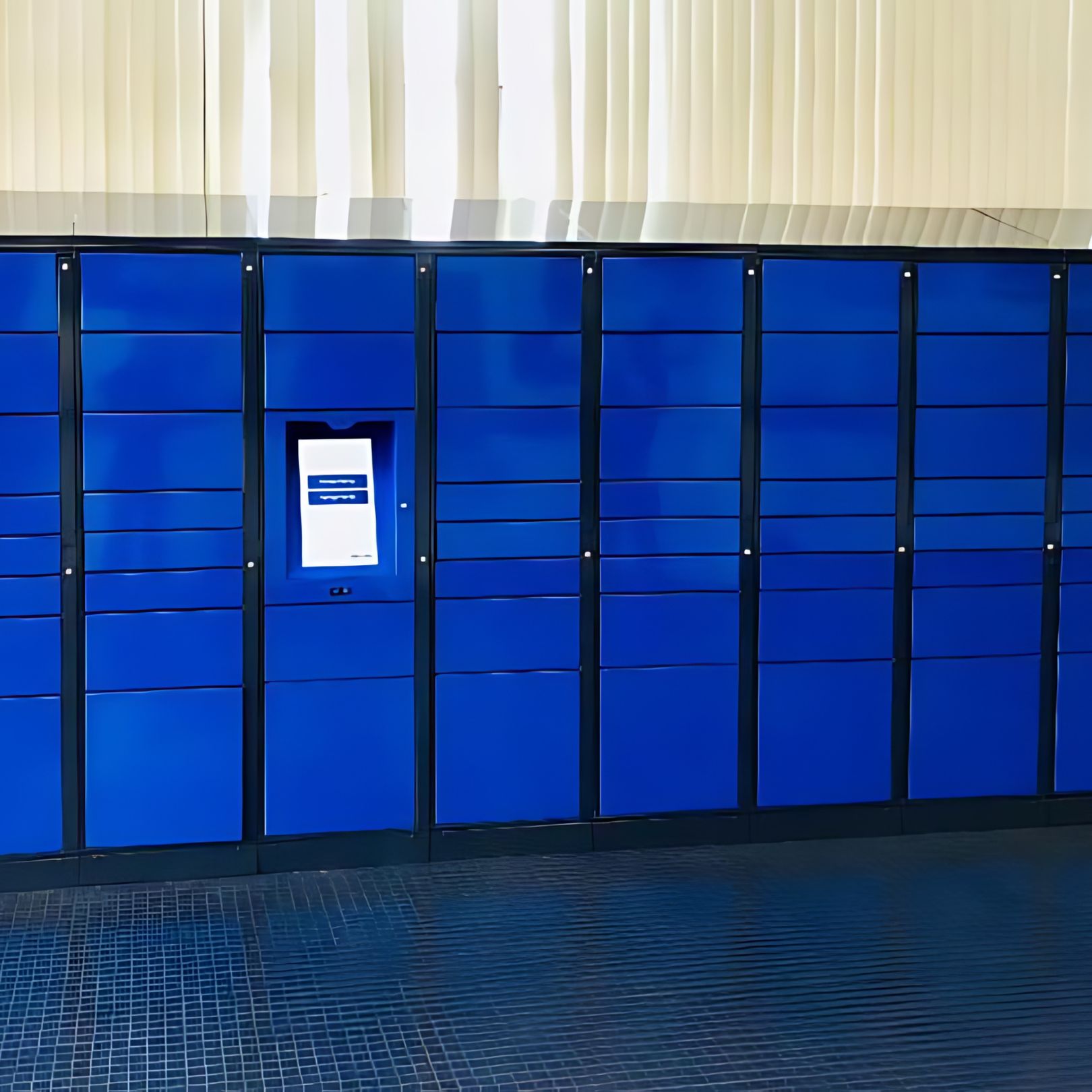 Rows of blue lockers, each featuring a digital display screen, are neatly lined against a wall with vertical blinds. The large set exudes an organized aesthetic, enhanced by the dark checkered floor pattern.