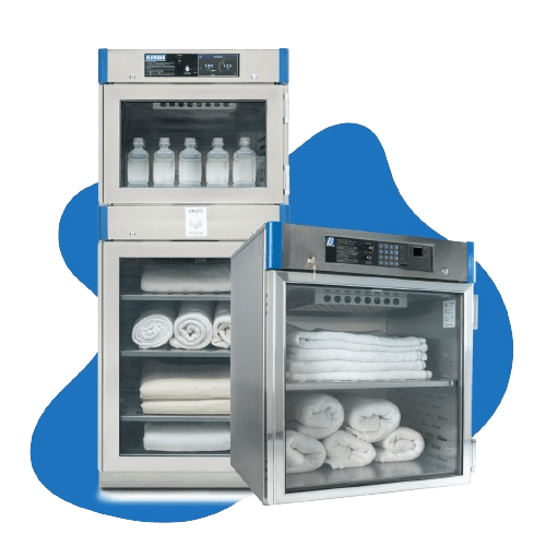 Two stainless steel medical warming cabinets: the upper one with bottles inside, and the lower one with towels. These Hospital Blanket Warmers have digital controls on top, ensuring precise temperature management against a blue abstract background.