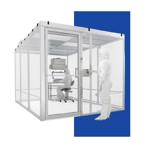 Two people in white protective suits work in a cleanroom, adhering to strict clean room standards. One sits at a desk with equipment inside the glass-walled room, while the other stands outside, preparing to enter. The isolated setting is highlighted against a blue background.