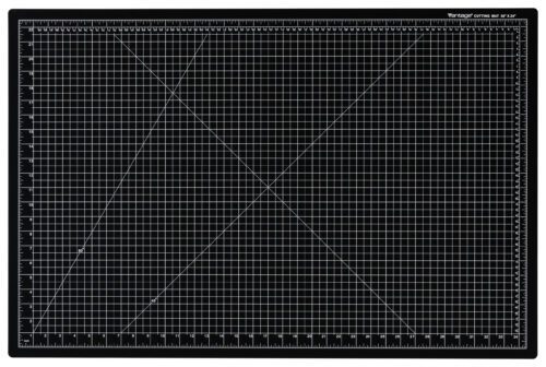 The Dahle Vantage® Premium Self-Healing Cutting Mat, 24 x 36, Black (Case of 8), features a white grid pattern with measurement markings in centimeters and inches, plus diagonal lines for angle precision.