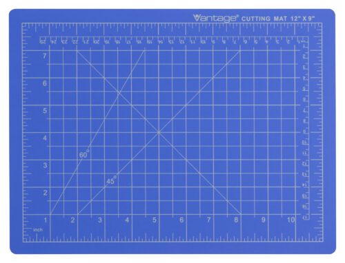 The Dahle Vantage® Premium Self-Healing Cutting Mat, 9 x 12, in blue, features white grid lines with inch measurements and diagonal guides at 60 and 45 degrees. Labeled Vantage Cutting Mat 12 x 9 on the top right, its ideal for detailed work. Available in a case of 48.