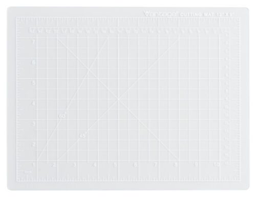 The 9 x 12 Dahle Vantage® Premium Self-Healing Cutting Mat, Crystal Clear, is semi-transparent with grid lines and inch measurements. Labeled Vantage at the top right corner, it offers durability and precision for any cutting task. Available by the case (48 mats).