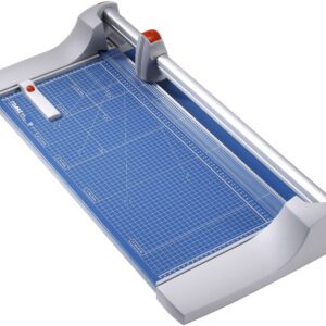 The Dahle 444 Premium Rotary Trimmer features a 26 cut length and a sleek gray and blue design. It includes a grid-lined cutting surface, sliding blade handle for precise trimming, and measurement markings for accuracy.