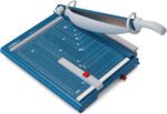 The Dahle 565 Premium Guillotine features a blue and silver design with a white handle, providing precision with its 15 cut length. It includes measurement guides and a grid for accuracy, while the blade lifts to reveal the sharp edge for exact cuts.