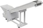 The Dahle PowerTEC® 919 CB Output Conveyor is an industrial-grade conveyor belt system on wheels, ideal for material handling. Featuring a hopper at one end and an upward-inclined flat belt, this white conveyor is supported by a robust frame.