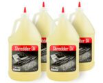 A case of four 1-gallon bottles of Dahle 20722 Shredder Oil, each with a red cap and a label featuring shredded paper, is perfect for maintaining your shredder’s performance and ensures youre well-stocked.