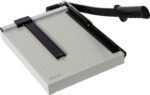 The Dahle Vantage® 12e Trimmer, featuring a grid surface, black handle, metal base, and safety guard, ensures precise 12 paper cuts. Available in a case of six.