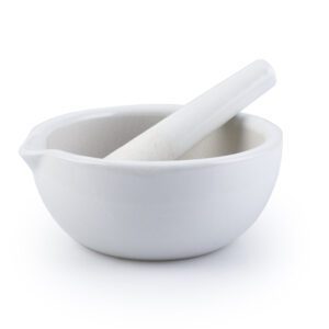 The MH-USA Mortar & Pestle, Porcelain, 130mm (320ml), features a sleek matte finish. The mortar has a spout and the pestle fits snugly inside.