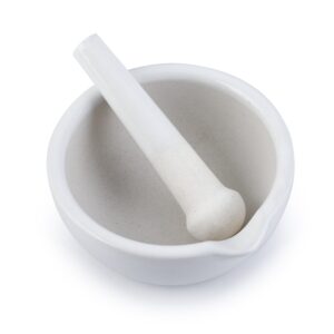 The MH-USA Mortar & Pestle, Porcelain, 160mm (500ml) set comes with a smooth white ceramic design, featuring a pestle resting inside the mortar that has a small spout for easy pouring and presents an unused appearance.