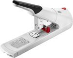 The Novus B50 Heavy Duty Stapler (Case of 10) has a white and silver design with a red adjustment knob, paper measurement guide, black-accented top, and clear base scale for precise sheet alignment.