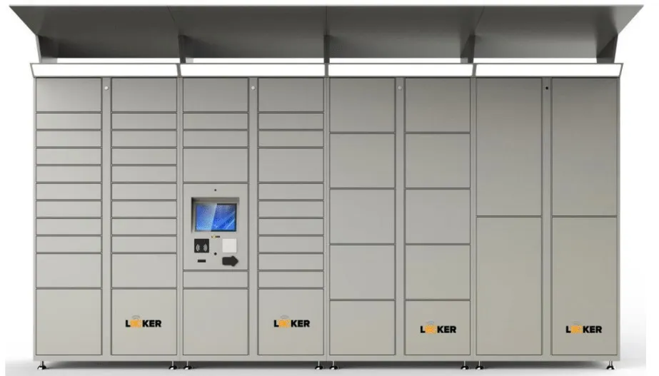 Large gray locker system with multiple compartments, featuring a digital screen and control panel in the center. This Utah parcel locker has a metal canopy on top and logos labeled LOCKER in the bottom sections.