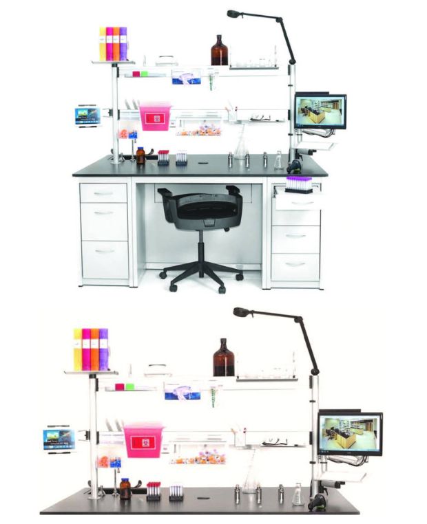 The laboratory bench setup boasts custom lab benches tailored to your needs, featuring phenolic countertops and lab furniture. A black countertop with white drawers complements an adjustable chair, computer monitor, shelves with bottles, lab tools, and colored paper boxes under bright overhead lighting for an organized workspace.
