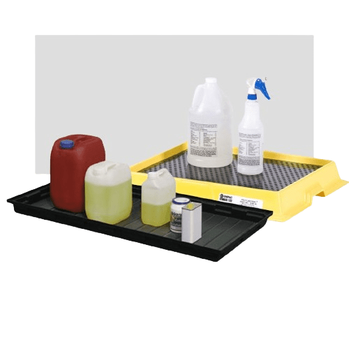 Two chemical spill trays: one yellow with white bottles, including a spray bottle; the other black with red, yellow, and clear containers. Both trays are used for spill containment or storage of potentially hazardous liquids.