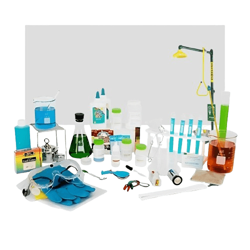 A collection of chemistry lab equipment on a table. Includes beakers with blue and orange liquids, test tubes, safety goggles, gloves, a thermometer, droppers, and various bottles of chemicals.