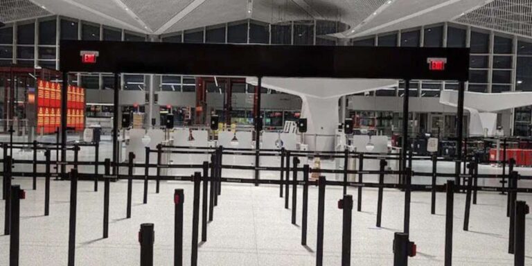 Airport check-in queue lanes and stanchions arranged for smooth passenger flow