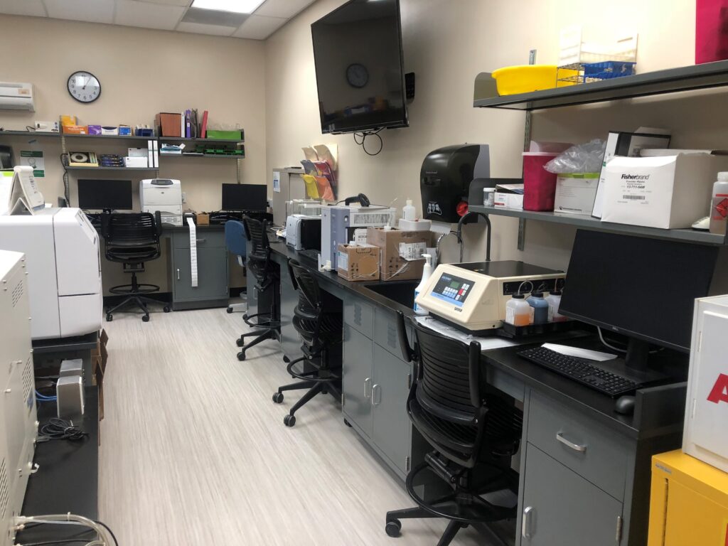 Student workstations at Weber State University with instruments, monitors and seating along the new bench run