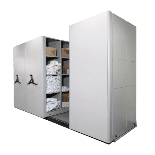 A mobile shelving unit by MH USA showcases gray panels, partially open to display neatly organized shelves stocked with folded white towels, white paper cups, and brown boxes. It features a manual crank system for easy access.