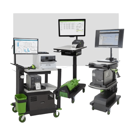 Three mobile computer workstations with screens, keyboards, printers, and green accents. Each station has wheels and various electronic equipment, designed for efficient workplace mobility and computing tasks—perfect for seamless integration into full warehouse design solutions.