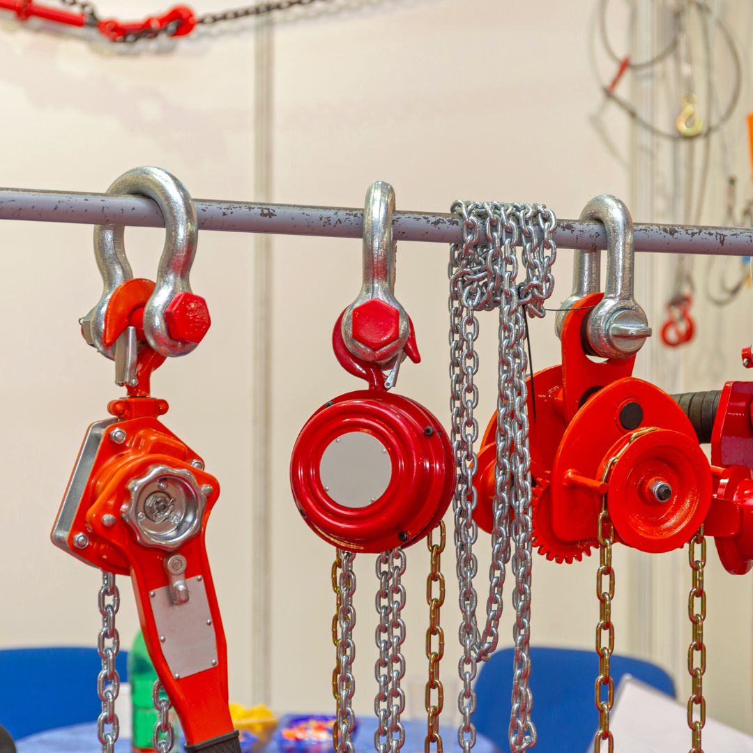 Chain hoists and lifting components displayed for inspection