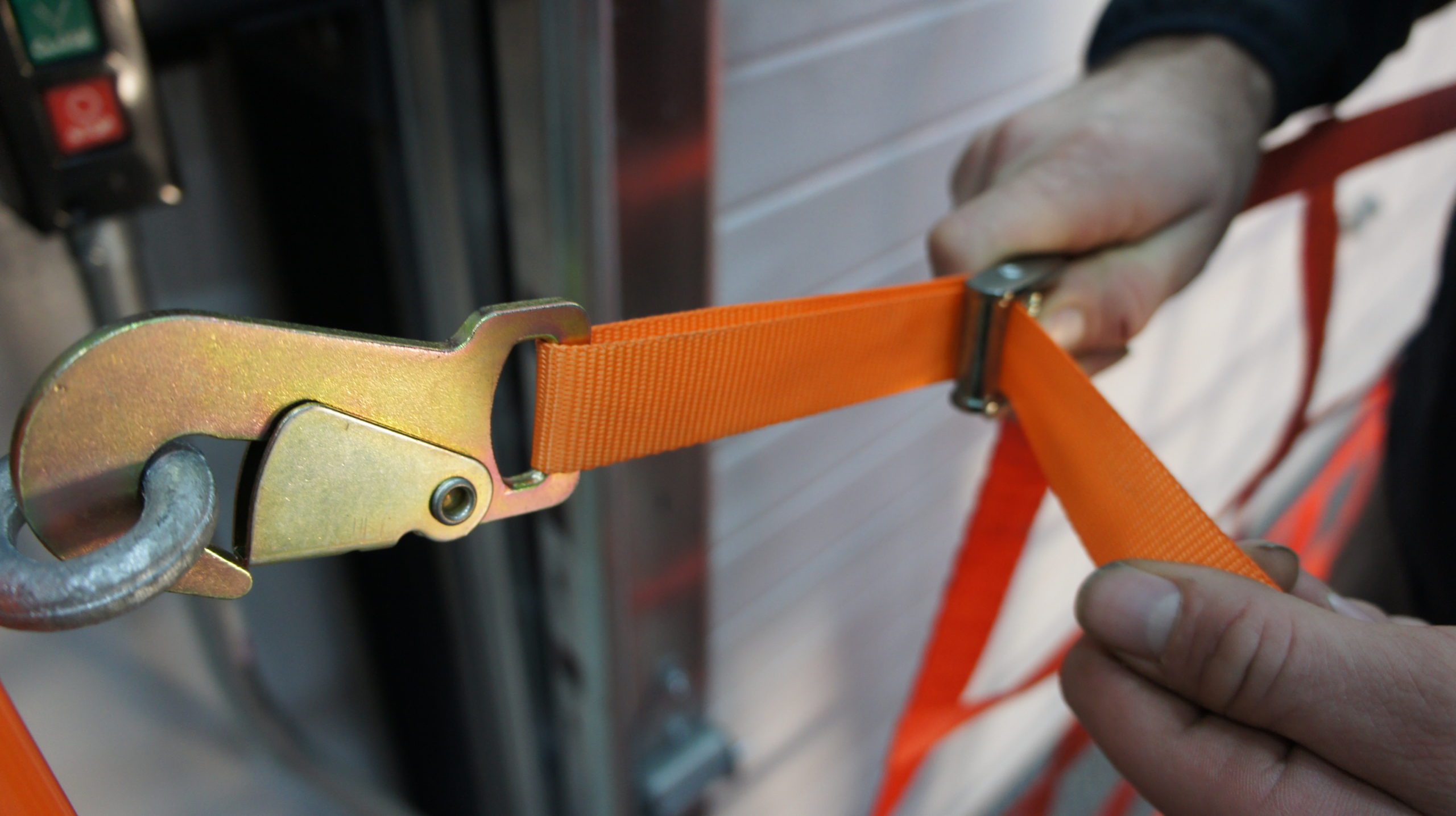 Close view of an adjustable web strap and connection