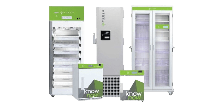 A row of medical refrigeration units in various sizes with green and white accents showcases transparent doors, digital displays, and vents. Fronted by two know now branded stands, they integrate seamlessly with Pegasuss RFID Failsafe Medical Inventory System for efficient management.