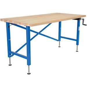 This adjustable workstation boasts a wooden workbench with a blue metal frame. It features height-adjustable legs and a hand crank on the right side for precise tilt adjustments, while sturdy metal crossbars enhance support and stability.